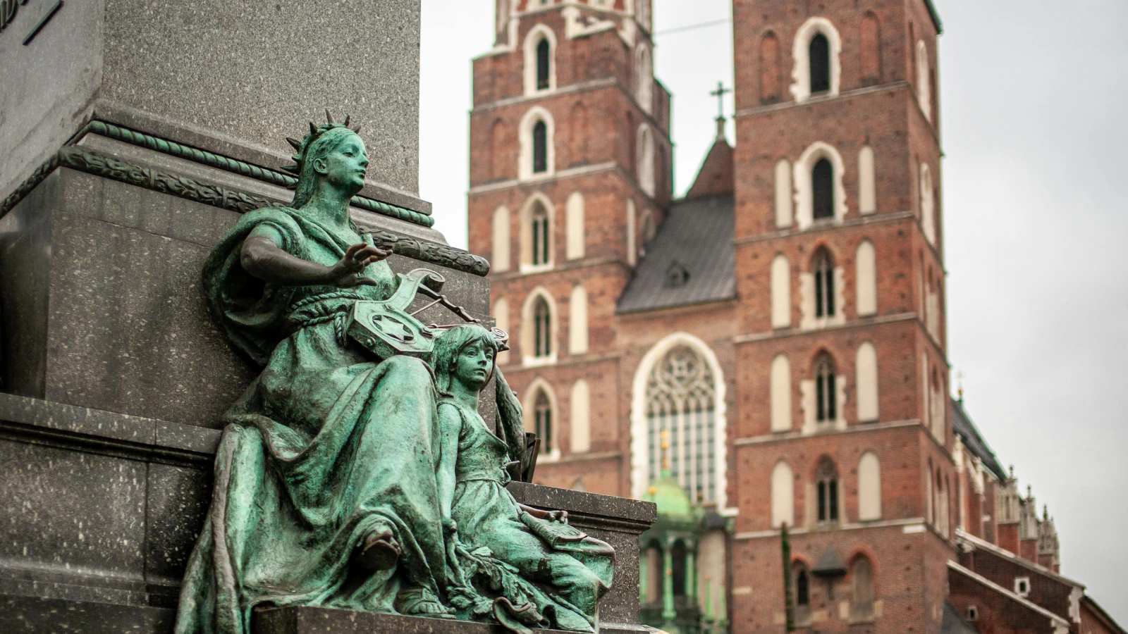 Statue near the Historical Museum of Kraków on Rynek Glowny